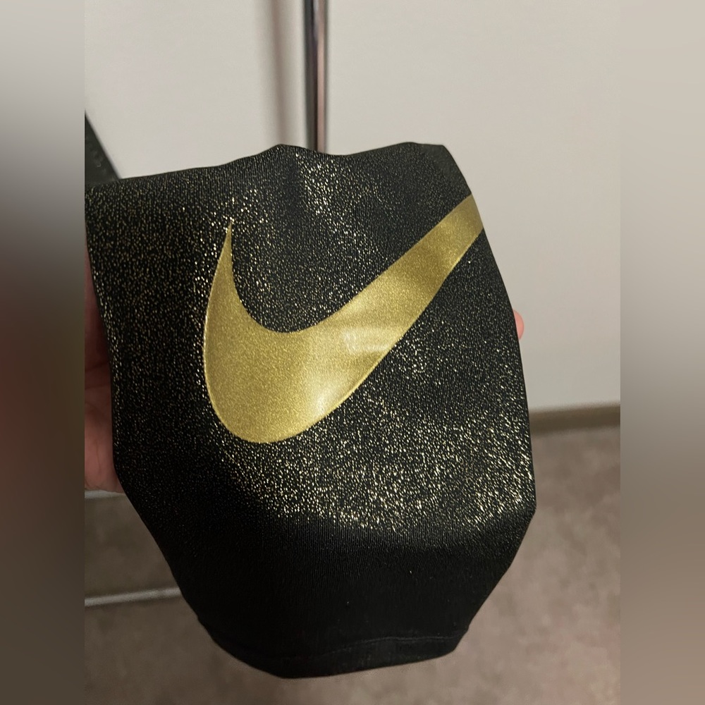 Black and gold sparkly Nike leggings